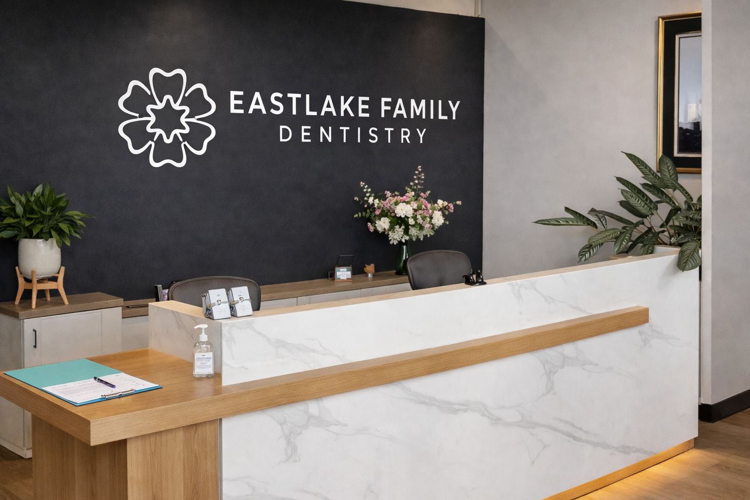 Reception desk with the Eastlake Family Dentistry sign